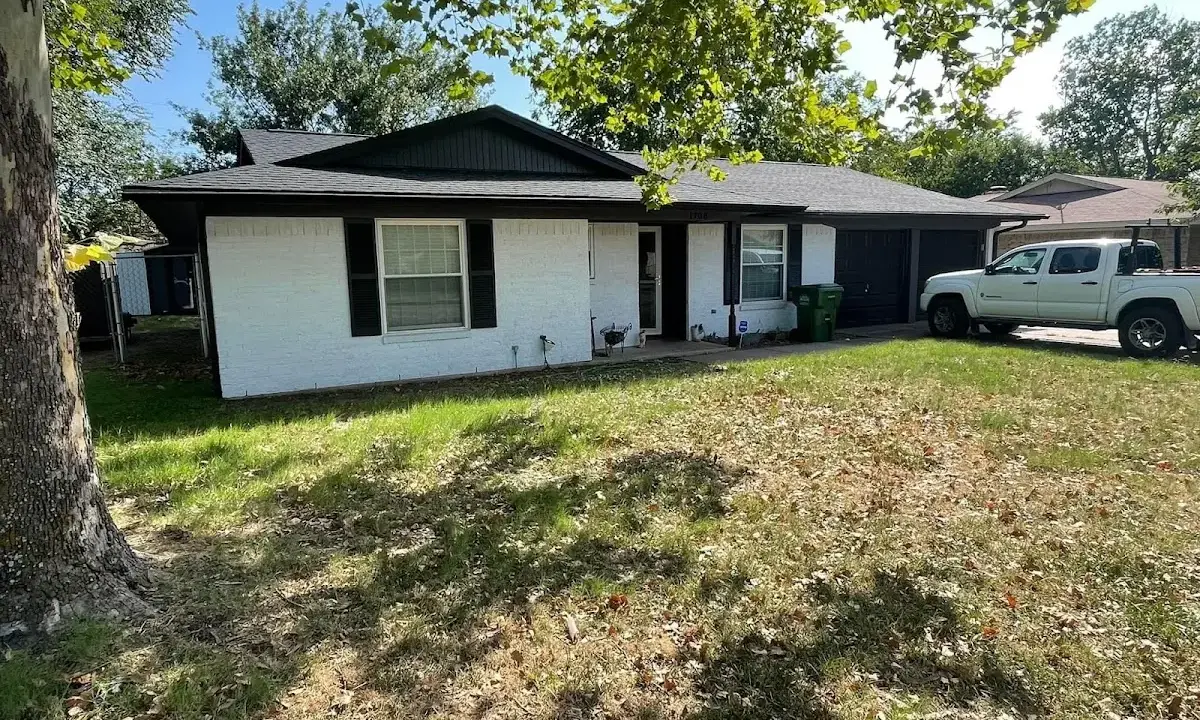 Professional roofing crew working on a residential roof in Washougal